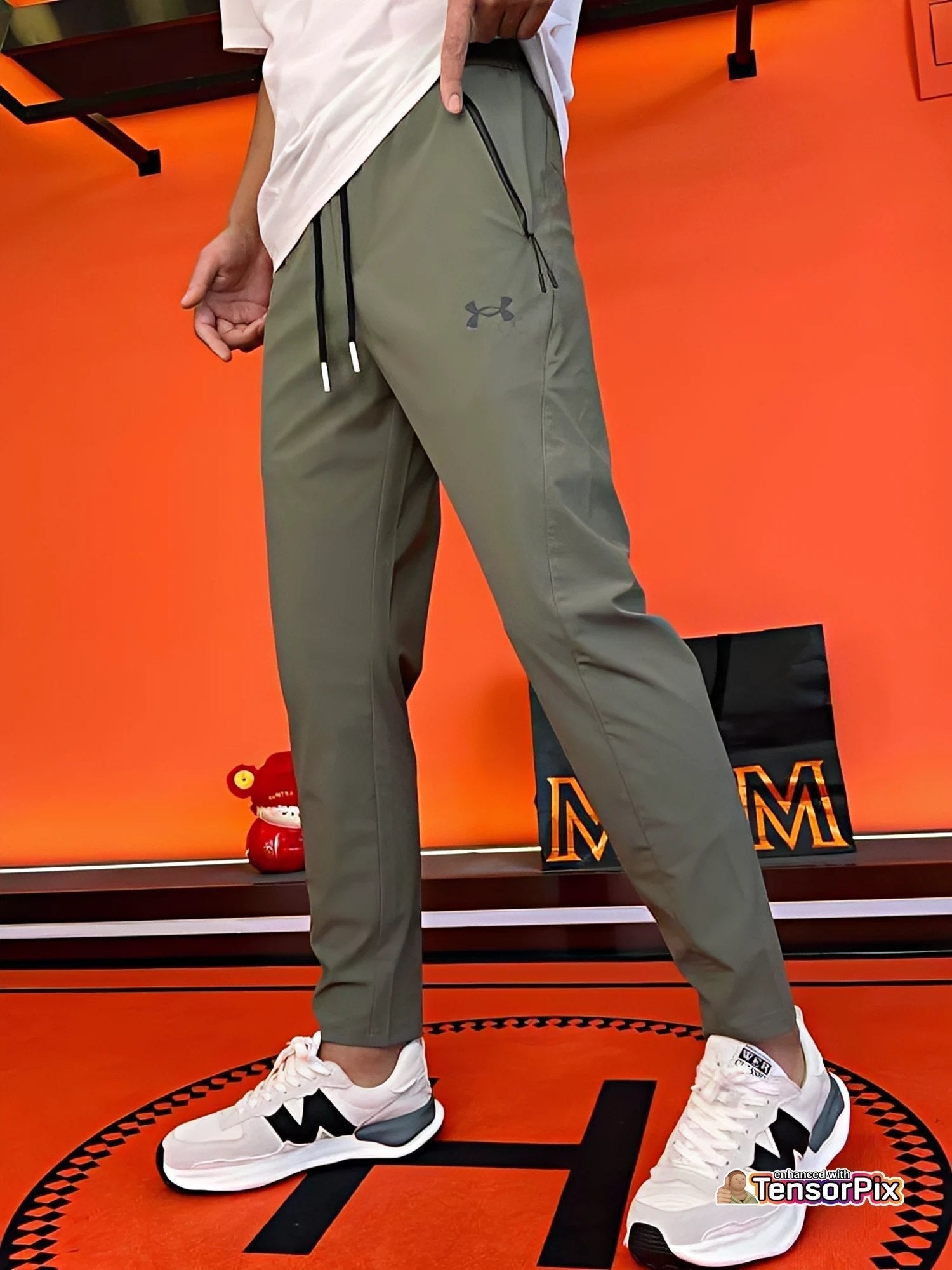 Pantalons ultra-élastiques unisexe - Under Armour