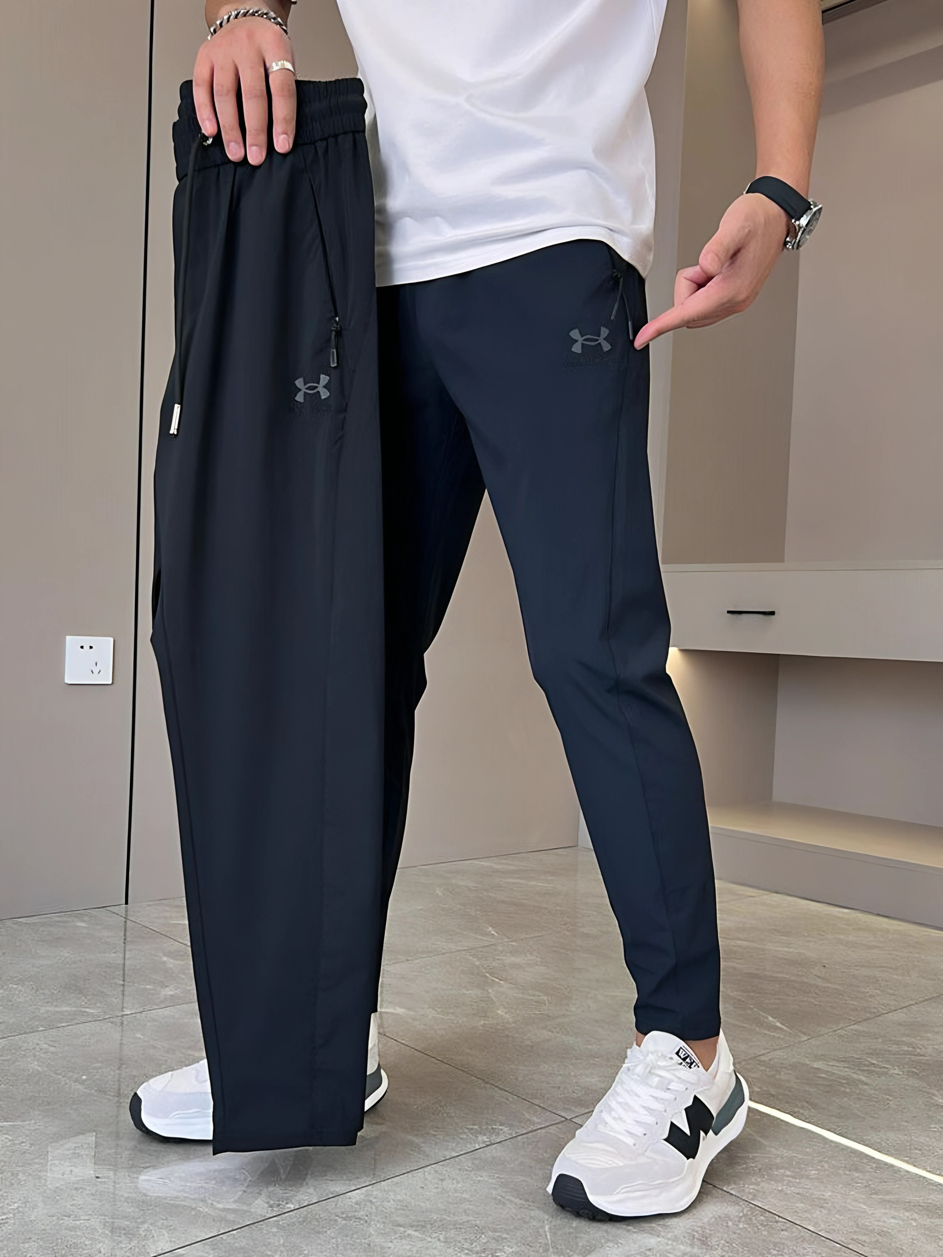 Pantalons ultra-élastiques unisexe - Under Armour